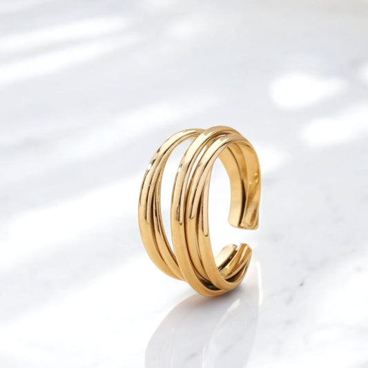 Bague Althea ANOË en acier inoxydable doré, design minimaliste à lignes croisées, bijou élégant et ajustable pour femme